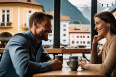Ein Mann und eine Frau unterhalten sich in einem Café in Innsbruck, Österreich.